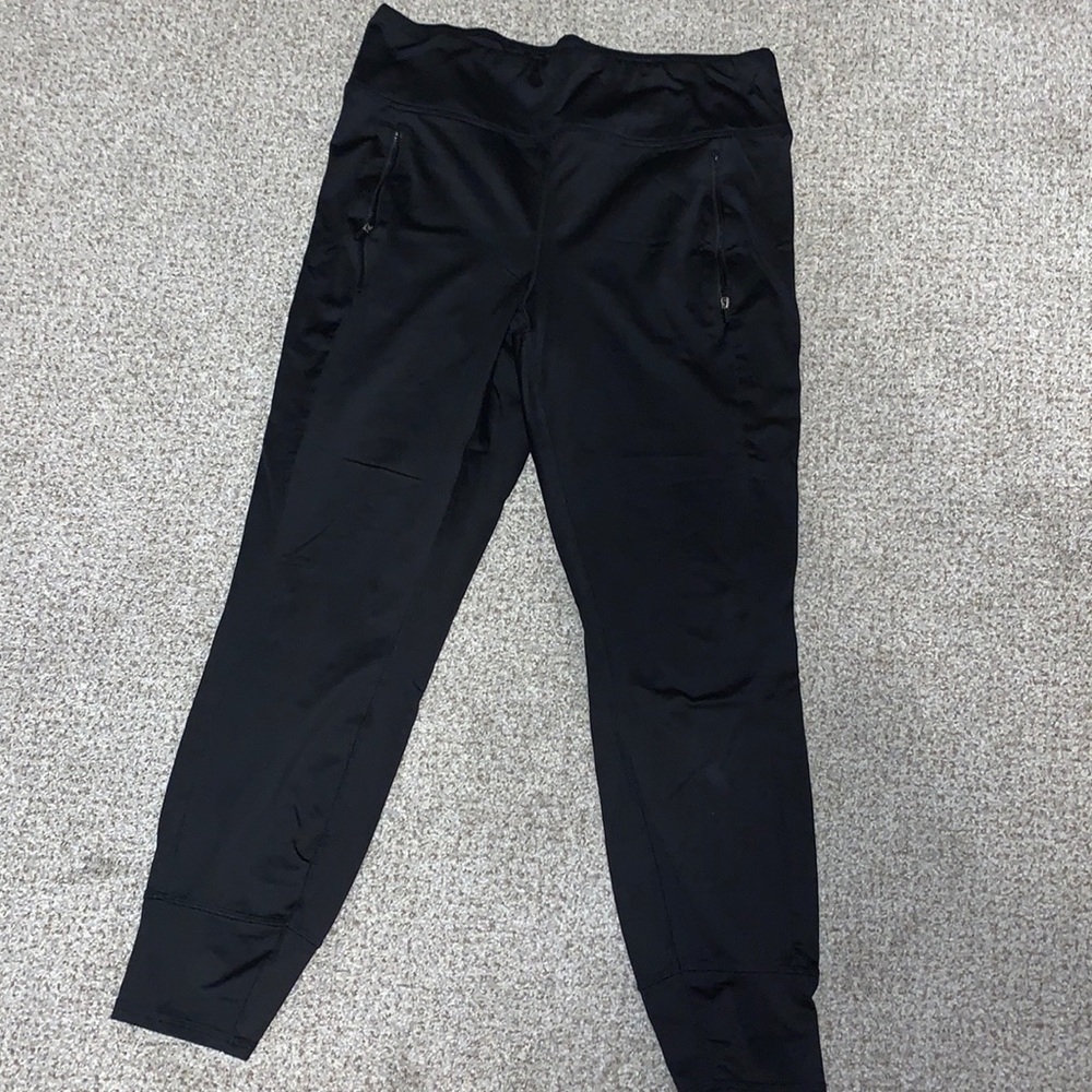 Black joggers with zipper pockets